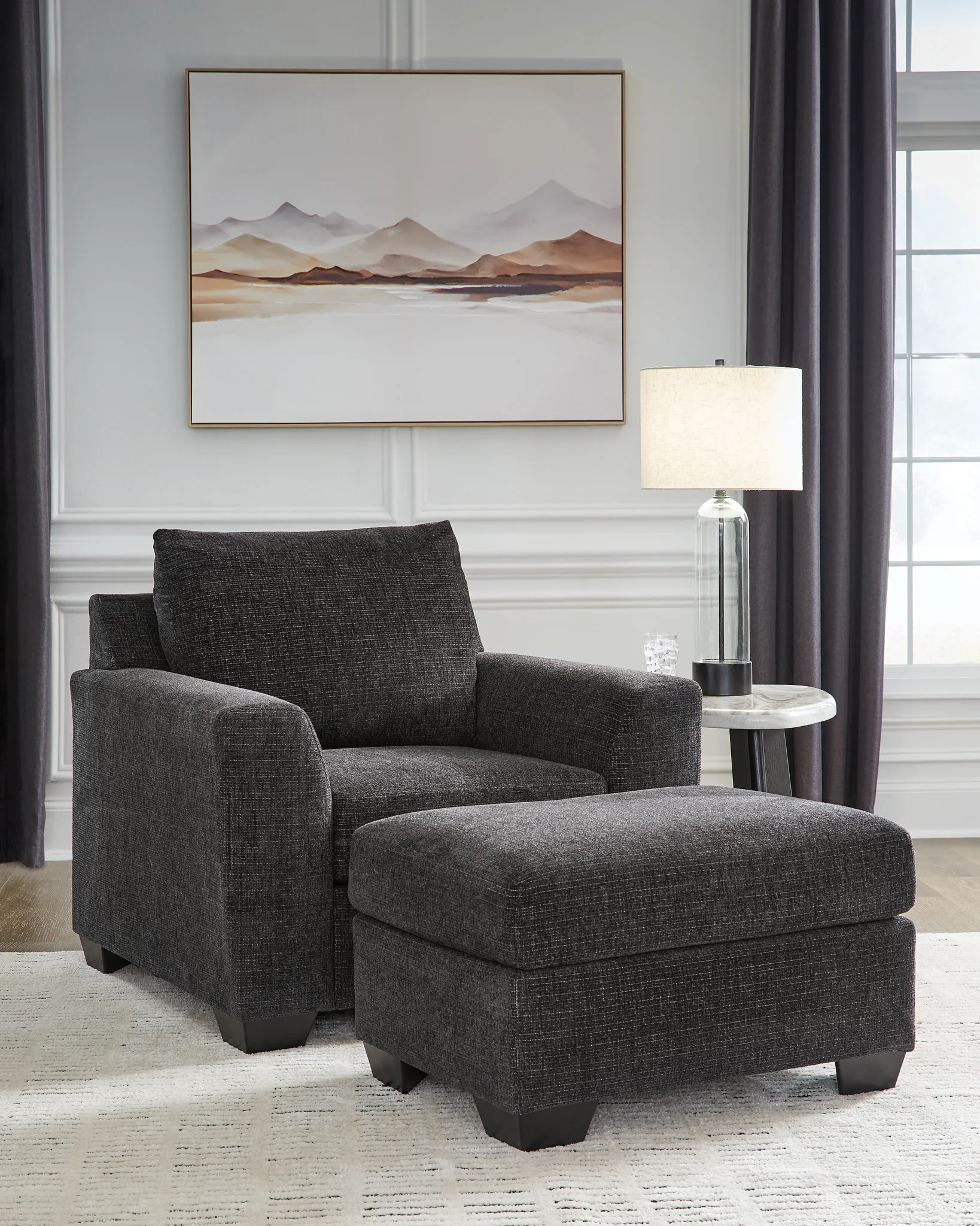 Loreo - 2 Pc. - Chair, Ottoman - Ebony