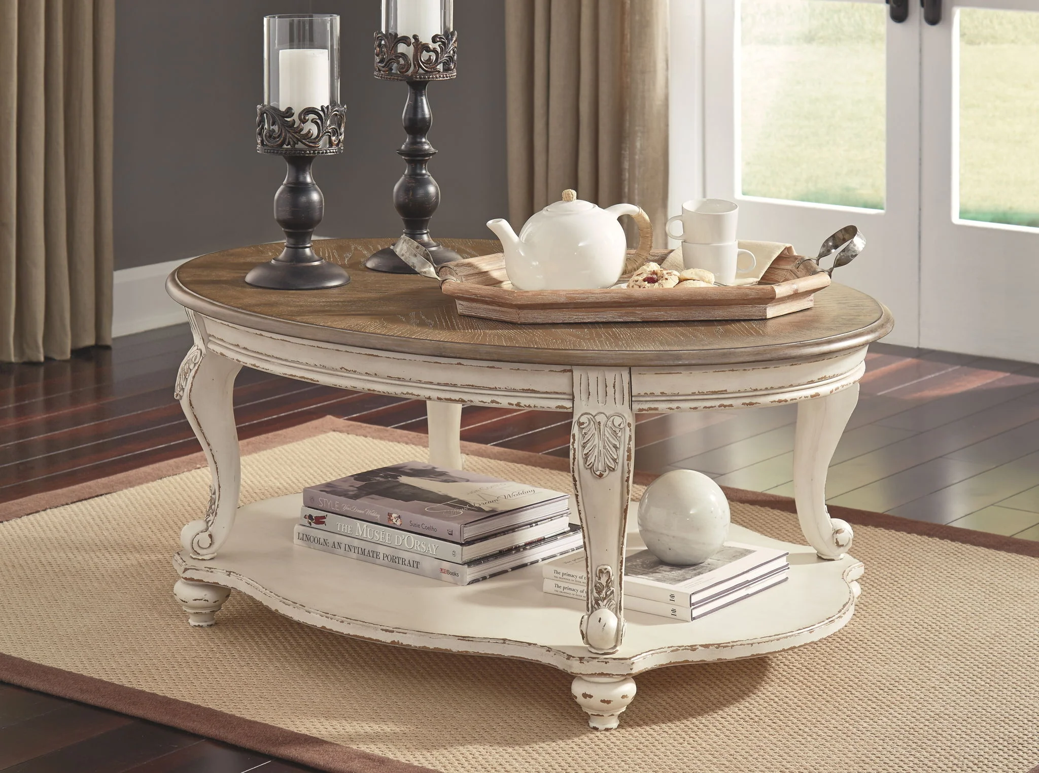 Realyn - White / Brown - Oval Cocktail Table - Image 2
