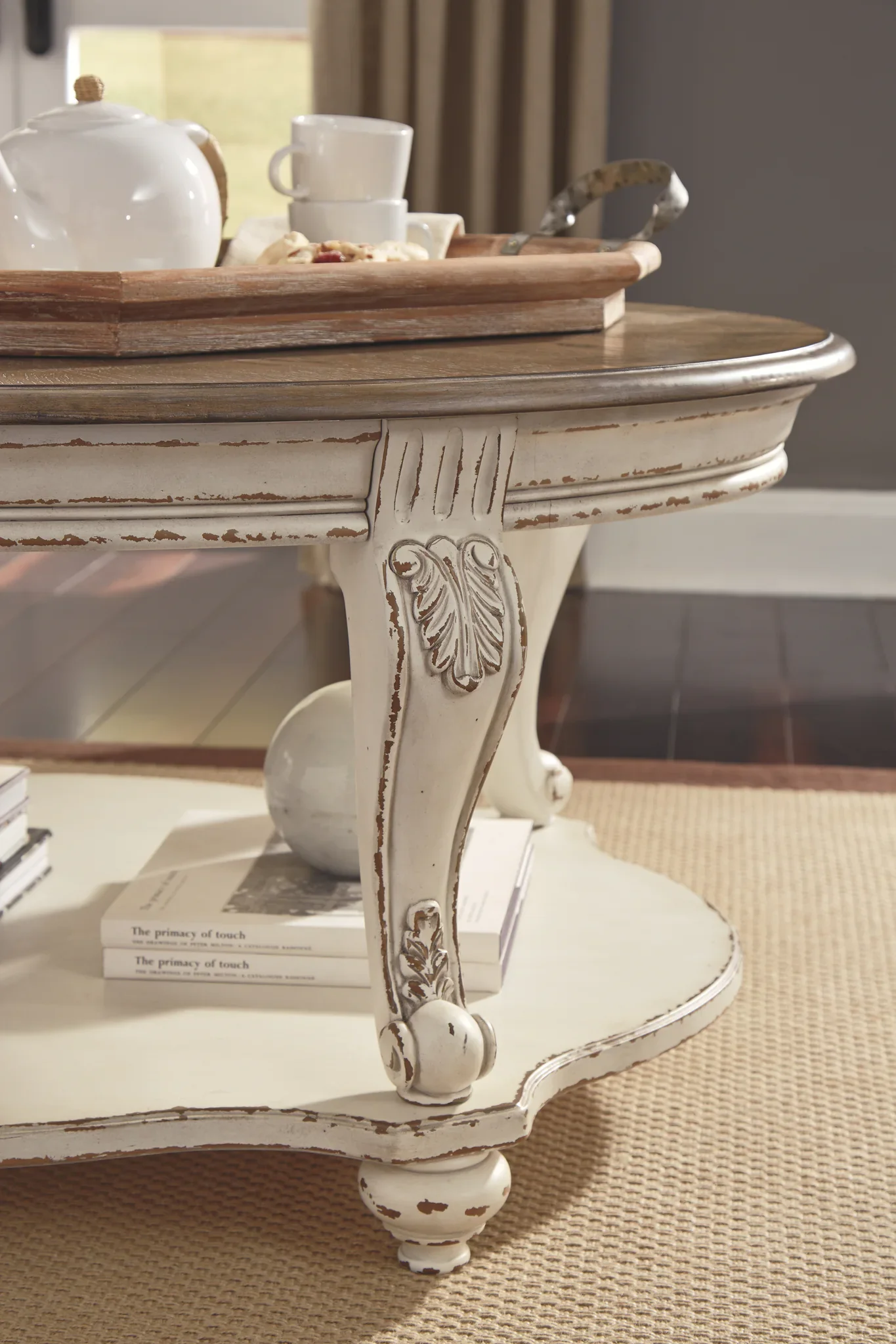 Realyn - White / Brown - Oval Cocktail Table - Image 6