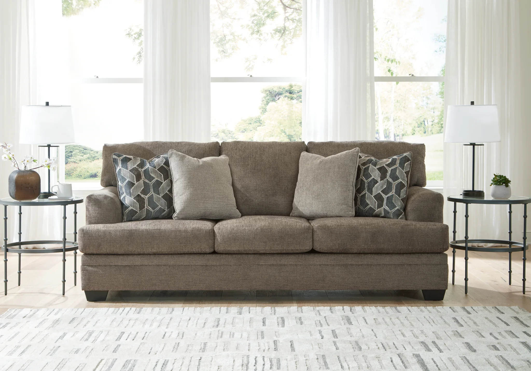 Stonemeade - 4 Pc. - Sofa, Loveseat, Chair And A Half, Ottoman - Nutmeg - Image 3