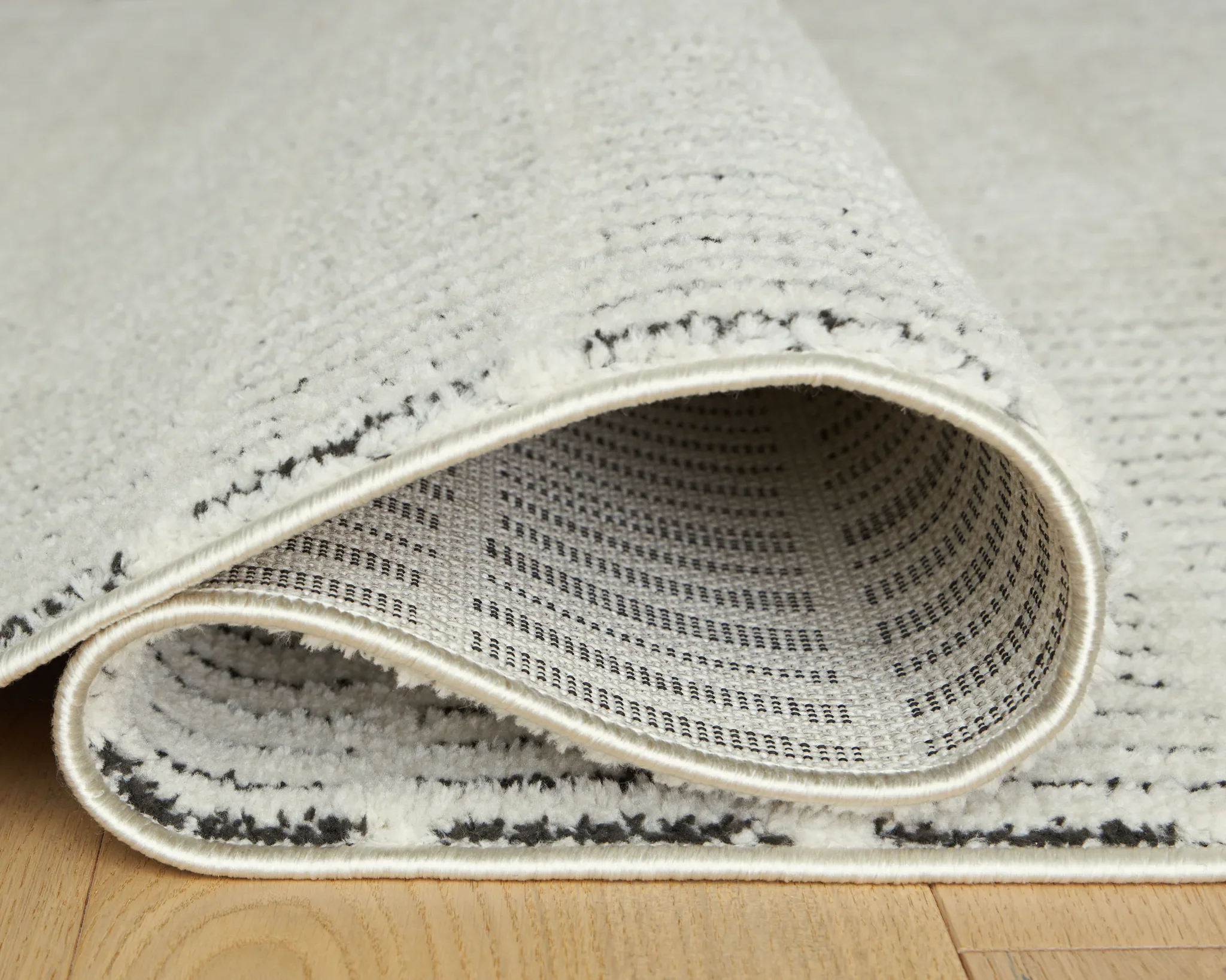 Turinwith - Ivory / Black - Large Rug - 8' x 10' - Image 4